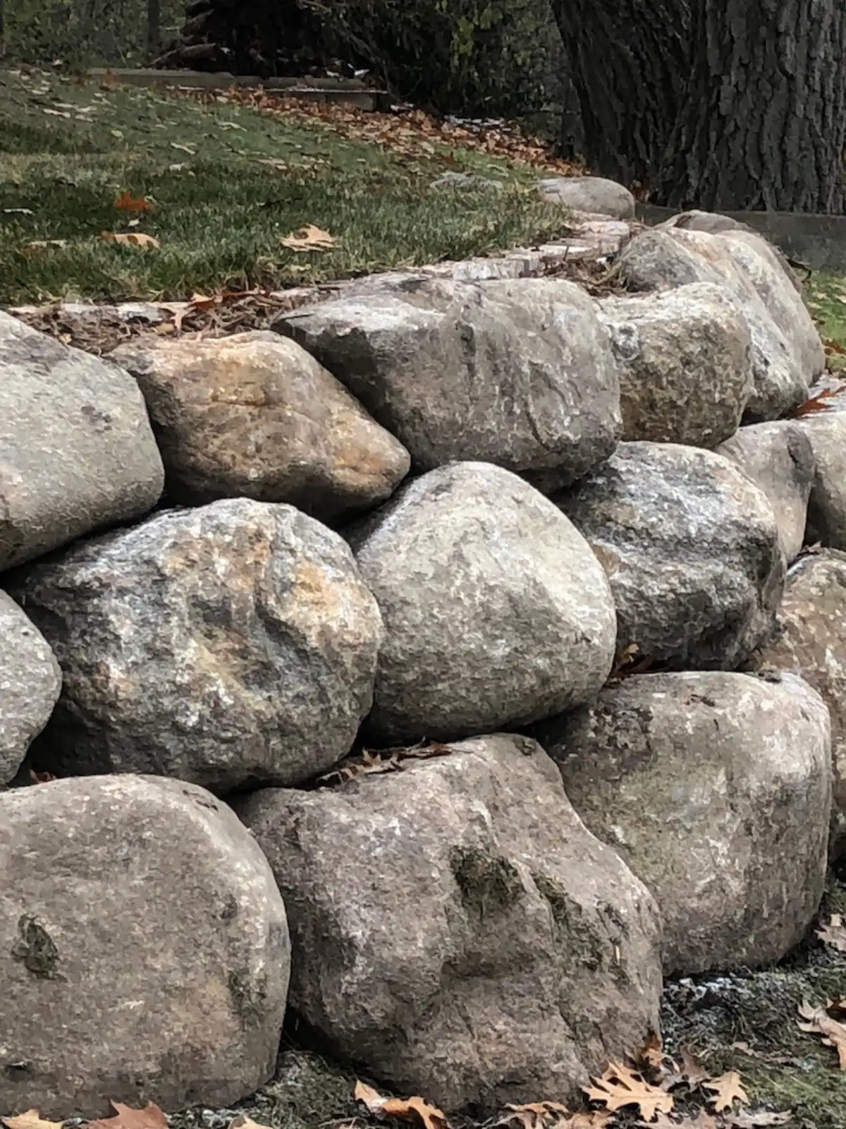 Close view of boulders in a retaining wall
